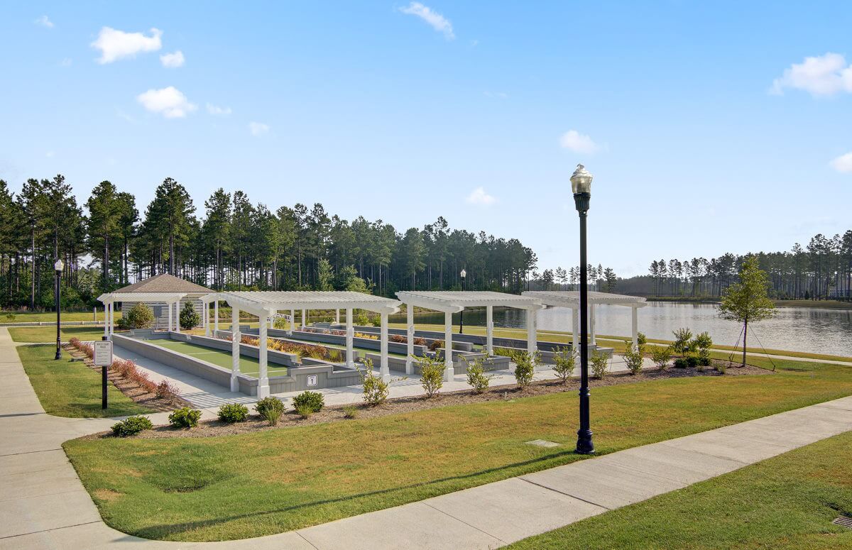 Four Seasons at Lakes of Cane Bay Shuffleboard Courts by the Lake